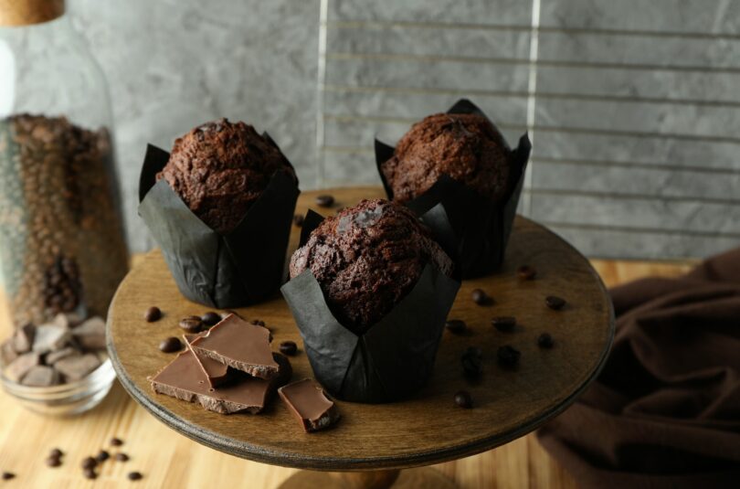 Concept of delicious food with chocolate muffins, close up