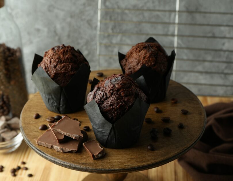 Concept of delicious food with chocolate muffins, close up